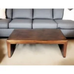 Goldoma 54-inch solid wood coffee table with copper-brass metal frame on living room floor
