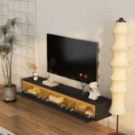 Goldoma floating floor mount TV stand with LED lights and power outlet for 65-inch TVs in high-gloss black finish
