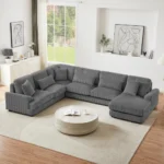 Goldoma 101.2-inch beige corduroy sectional sofa with deep seating and side pockets in a living room