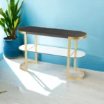Goldoma 49 inch gray and gold oval console table with solid wood top and storage shelf in a living room