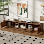 Modern wood TV stand for TVs up to 80 inches with cable management and soft-close hinges in a living room