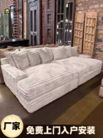 Goldoma white L-shaped velvet sofa in living room with wood frame and removable covers