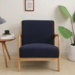 Goldoma stretch armchair slipcover with zipper in a living room, showing a snug fit on a standard armchair