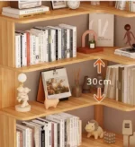 Goldoma solid wood corner bookcase with multiple open shelves in a modern living room