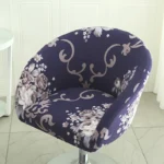 Goldoma semi-circular chair cover on a curved dining chair – stretch knit slipcover protects and decorates