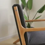 Goldoma stretch armchair slipcover with zipper in a living room, showing a snug fit on a standard armchair