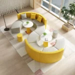 Goldoma modern S-shape PU leather modular sectional sofa set in an office lobby