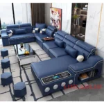 Goldoma U-shaped sectional sofa with built-in Bluetooth speakers and chaise lounge in a modern living room