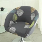 Goldoma semi-circular chair cover on a curved dining chair – stretch knit slipcover protects and decorates