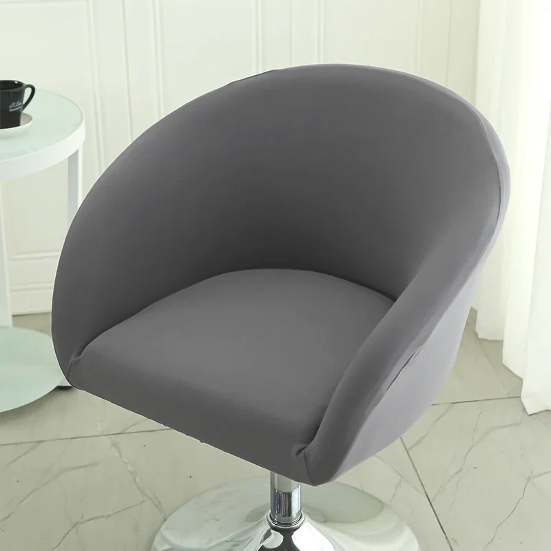 S2b2a075872c84c9a9130016e6f108b044.webp Goldoma semi-circular chair cover on a curved dining chair – stretch knit slipcover protects and decorates