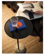 Round marble side table - mid century modern end table with natural marble top and black metal frame in living room