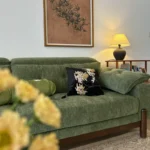 Goldoma Minimalist U-Shape Sectional Sofa in green chenille fabric with sofa bed function for modern living rooms
