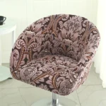 Goldoma semi-circular chair cover on a curved dining chair – stretch knit slipcover protects and decorates