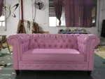 Goldoma PU Leather Chesterfield sofa set in modern living room with tufted back and aluminum legs