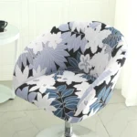 Goldoma semi-circular chair cover on a curved dining chair – stretch knit slipcover protects and decorates