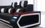 Goldoma genuine leather sectional sofa with LED lighting, storage shelves, USB ports, and cup holders in a modern living room
