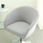 Goldoma semi-circular chair cover on a curved dining chair – stretch knit slipcover protects and decorates