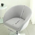 Goldoma semi-circular chair cover on a curved dining chair – stretch knit slipcover protects and decorates