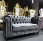 Goldoma PU Leather Chesterfield sofa set in modern living room with tufted back and aluminum legs