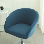Goldoma semi-circular chair cover on a curved dining chair – stretch knit slipcover protects and decorates