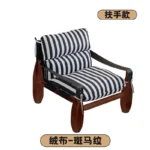 Goldoma Nordic Minimalist Living Room Sofa with black legs in a modern living room setting