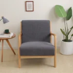 Goldoma stretch armchair slipcover with zipper in a living room, showing a snug fit on a standard armchair
