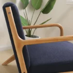 Goldoma stretch armchair slipcover with zipper in a living room, showing a snug fit on a standard armchair