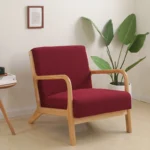 Goldoma stretch armchair slipcover with zipper in a living room, showing a snug fit on a standard armchair