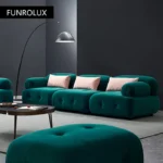 Goldoma L-shaped velvet sleeper sofa in modern living room with chaise and pull-out bed