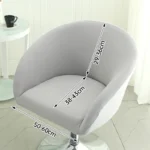 Goldoma semi-circular chair cover on a curved dining chair – stretch knit slipcover protects and decorates