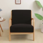 Goldoma stretch armchair slipcover with zipper in a living room, showing a snug fit on a standard armchair