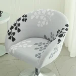 Goldoma semi-circular chair cover on a curved dining chair – stretch knit slipcover protects and decorates