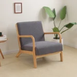 Goldoma stretch armchair slipcover with zipper in a living room, showing a snug fit on a standard armchair
