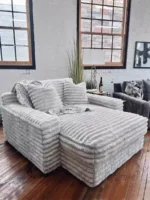 Goldoma white L-shaped velvet sofa in living room with wood frame and removable covers