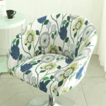 Goldoma semi-circular chair cover on a curved dining chair – stretch knit slipcover protects and decorates