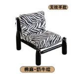 Goldoma Nordic Minimalist Living Room Sofa with black legs in a modern living room setting
