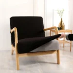 Goldoma stretch armchair slipcover with zipper in a living room, showing a snug fit on a standard armchair