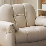 Goldoma compact modern tufted sofa in a living room – minimalist Chesterfield style with tufted back
