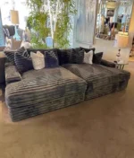 Goldoma white L-shaped velvet sofa in living room with wood frame and removable covers