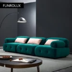 Goldoma L-shaped velvet sleeper sofa in modern living room with chaise and pull-out bed
