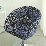 Goldoma semi-circular chair cover on a curved dining chair – stretch knit slipcover protects and decorates
