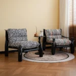 Goldoma Nordic Minimalist Living Room Sofa with black legs in a modern living room setting