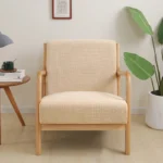Goldoma stretch armchair slipcover with zipper in a living room, showing a snug fit on a standard armchair