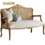 Goldoma French carved wood velvet single sofa in gold fabric with hand-carved details, ideal for living rooms