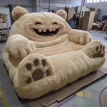 Goldoma creative animal sofa bed in modern living room, upholstered in soft fabric, converted to a bed