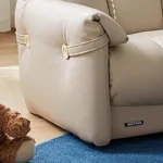 Goldoma compact modern tufted sofa in a living room – minimalist Chesterfield style with tufted back
