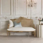 Goldoma French carved wood velvet single sofa in gold fabric with hand-carved details, ideal for living rooms