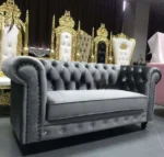Goldoma PU Leather Chesterfield sofa set in modern living room with tufted back and aluminum legs
