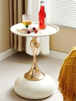 Goldoma modern side table with light grey iron frame placed in a living room corner