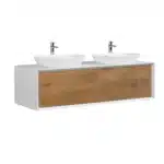 Vanity in a showroom setting, with polished chrome hardware and a large mirror reflecting the double sinks.